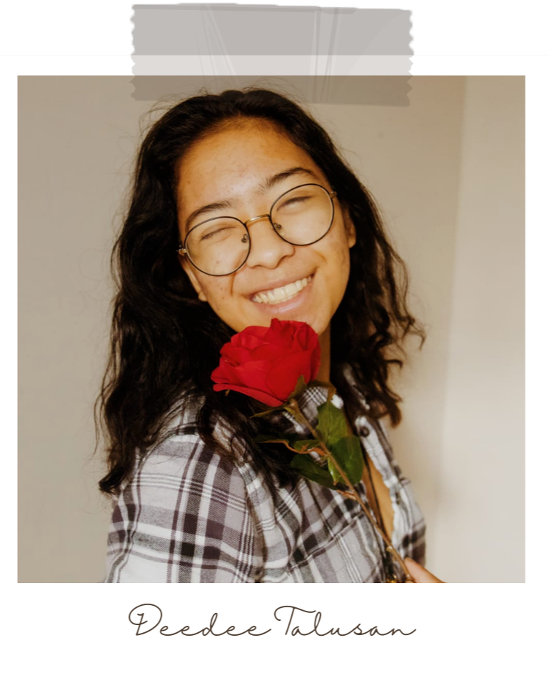 Deedee Talusan is winking playfully at the camera, with a rose in their hands. 