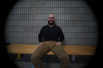 Editor sitting on bench